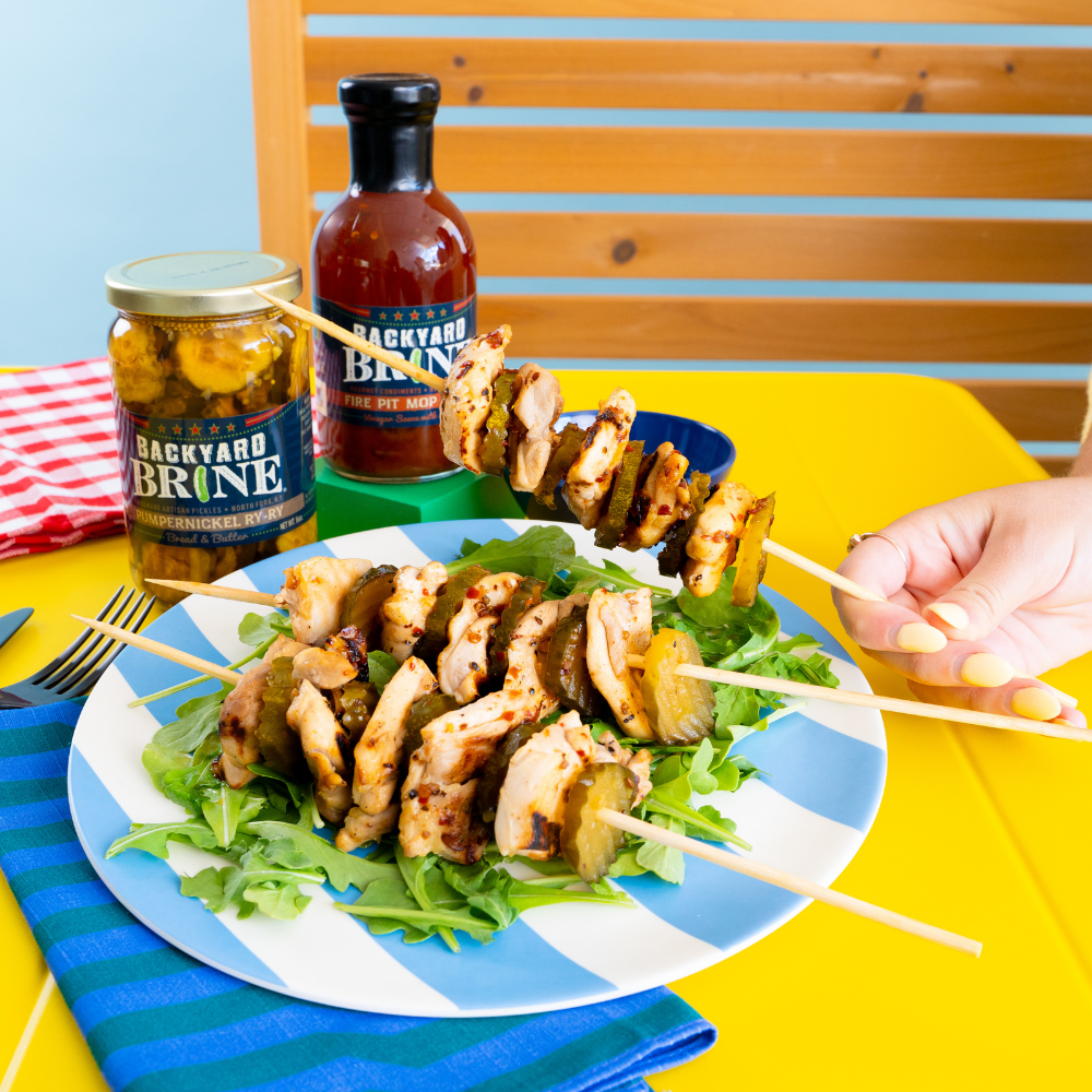 grilled chicken and pickles on skewers